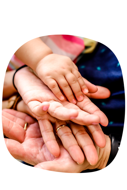 A child and parent hands